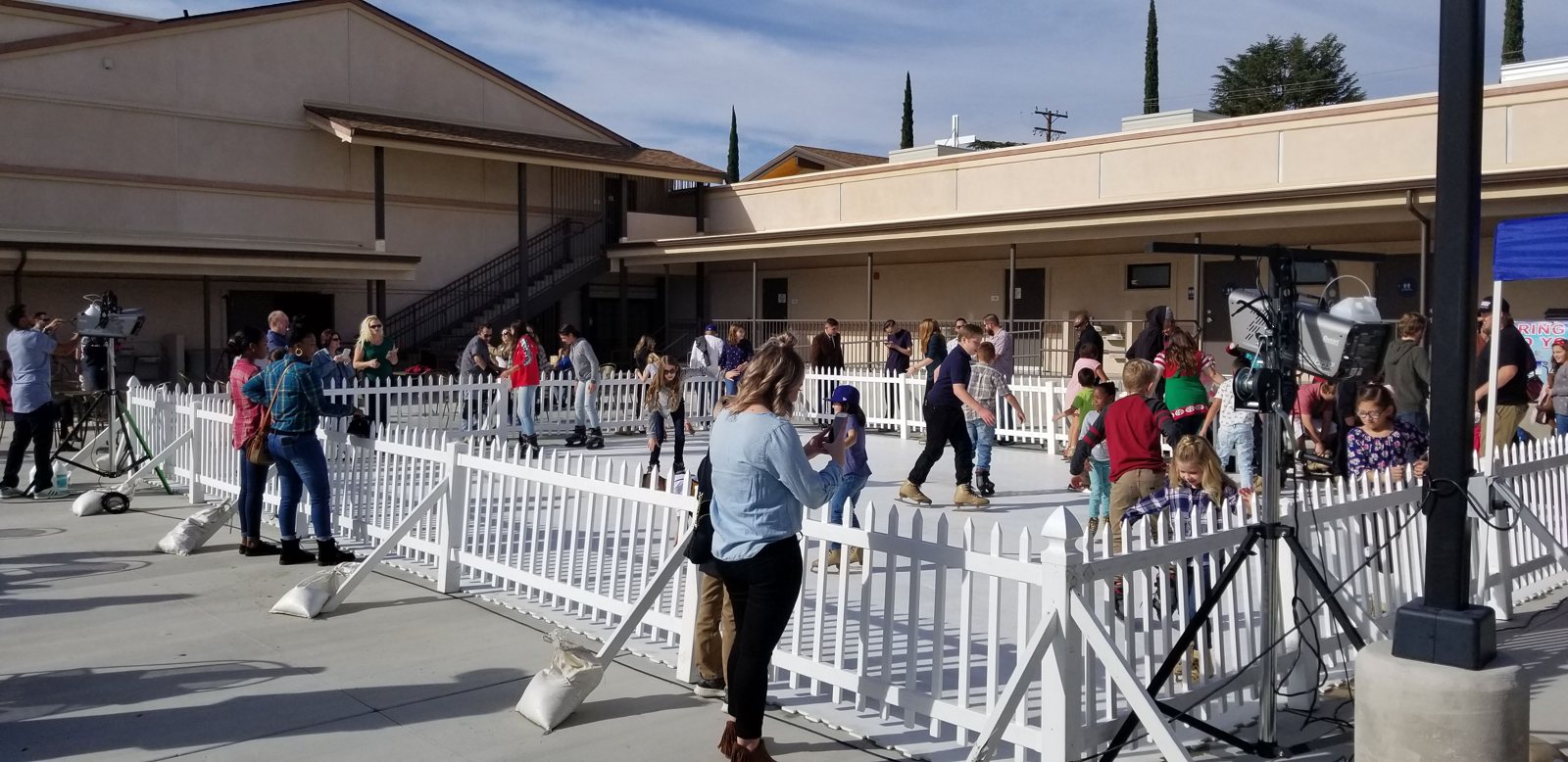 Synthetic ice rink set up in an outdoor courtyard