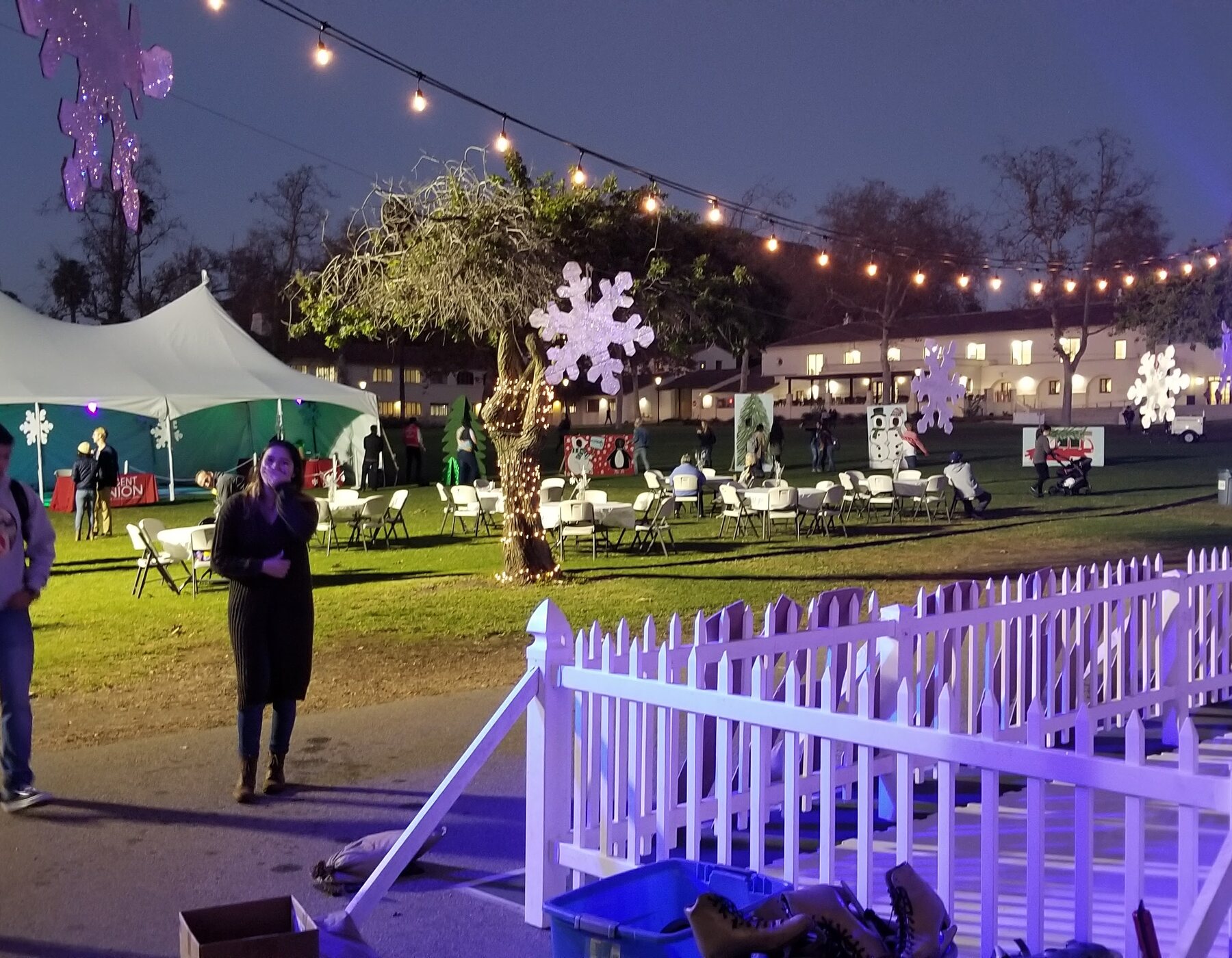Holiday rink illuminated for an evening event