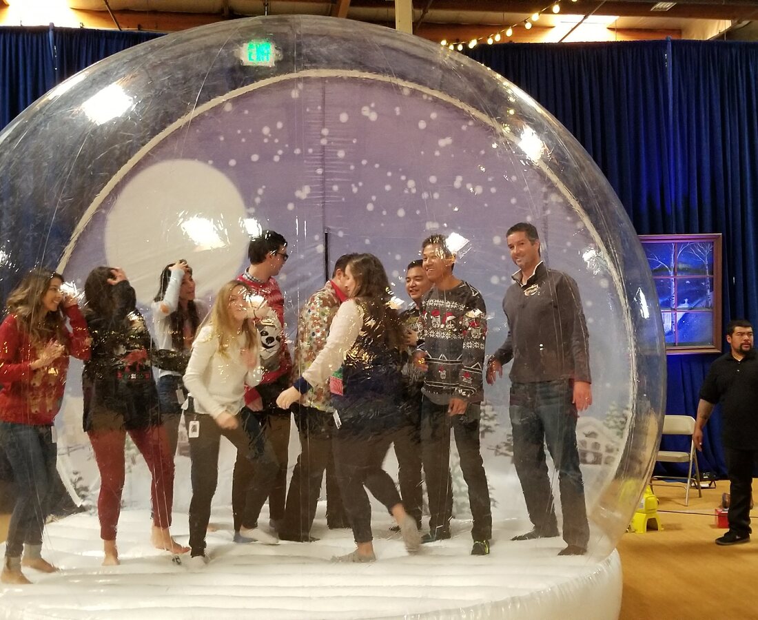 Giant snow globe attraction at a holiday event